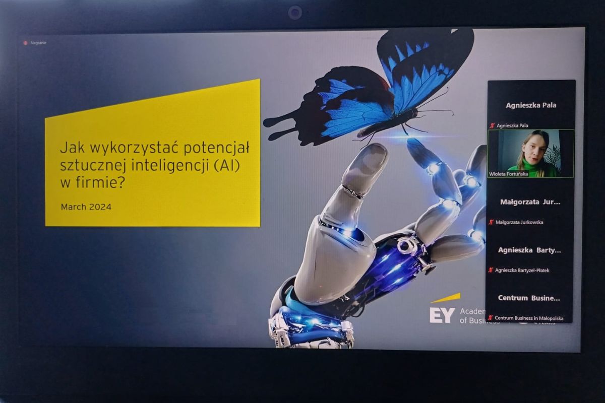 Ręka robota trzymająca motyla, obok napis: Jak wykorzystać potencjał sztucznej inteligencji (AI w firmie?)