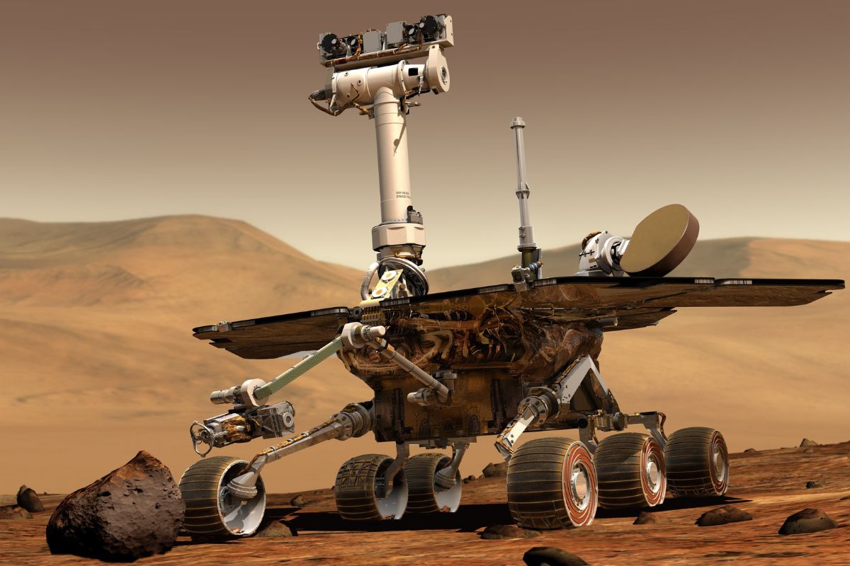 robot poruszający się na kołach, badający w kosmosie powierzchnię planety Mars